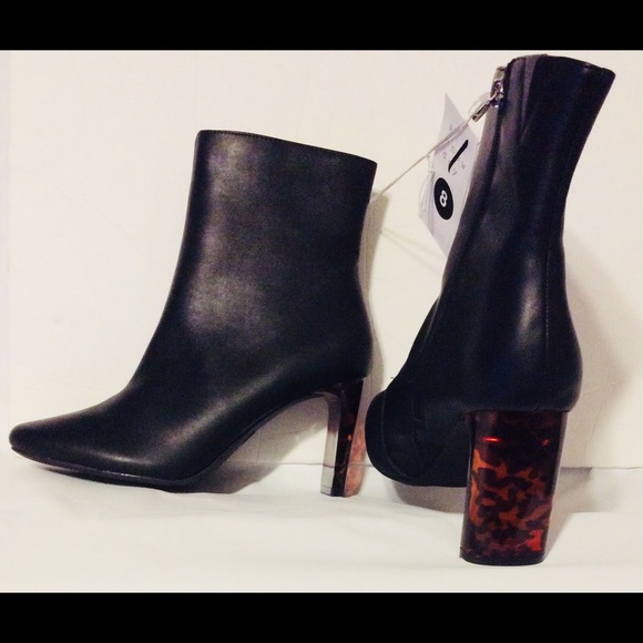 black boots with tortoise heel